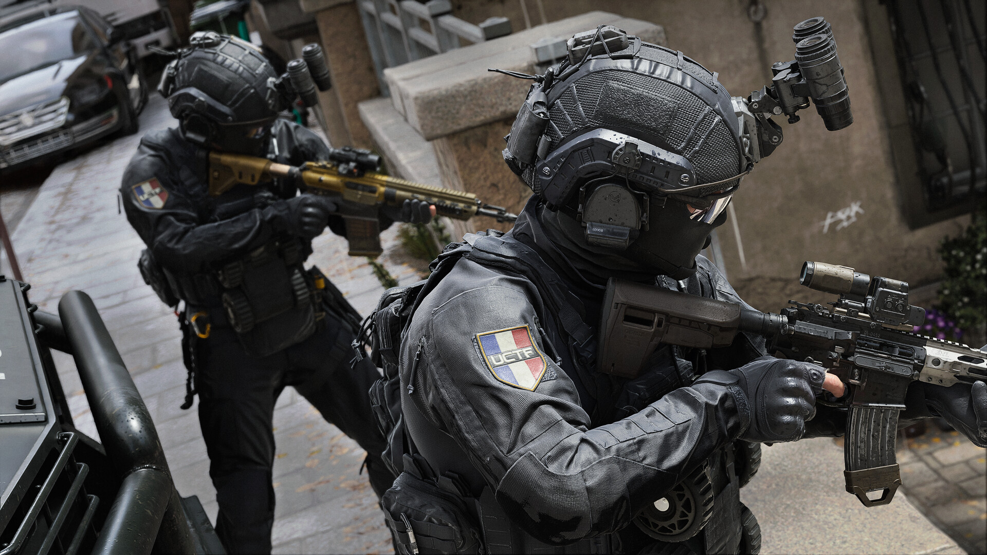 Close-quarters combat, the multiplayer texture. Official screenshot, Activision. Two GIGN-style operators clearing a European street in close-quarters combat
